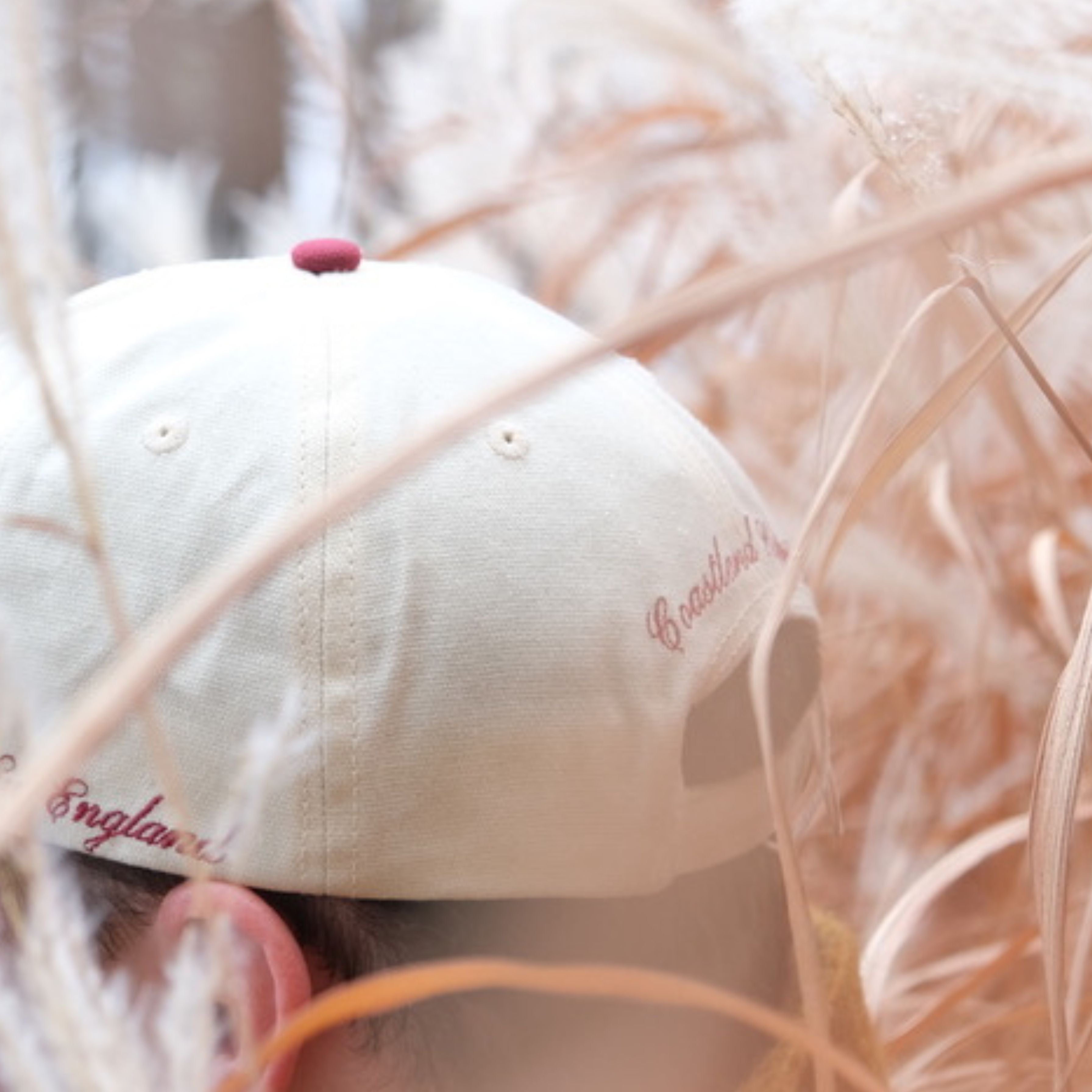 Waxed Canvas Premium Baseball cap with 'New England' script and logo. 