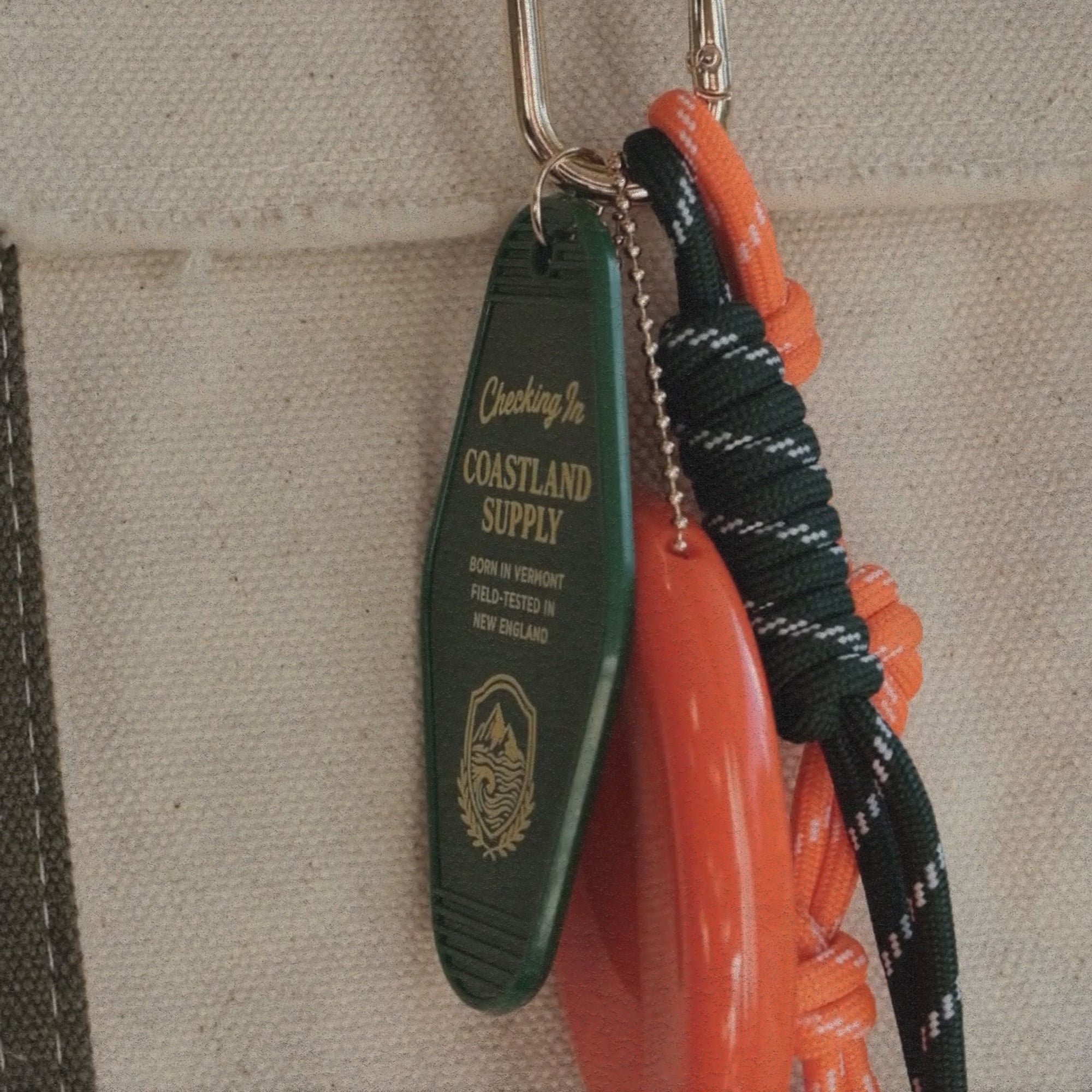 The Coastland Check-In Charm